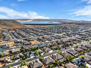 Aerial perspective of suburban area with a water and mountain view