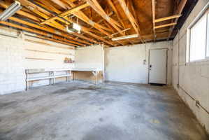 Garage featuring a garage door opener