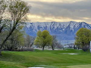 View of community featuring a mountain view and view of golf course