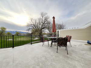 View of patio / terrace featuring outdoor dining area and a mountain view