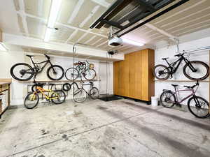Garage featuring bike storage and a garage door opener