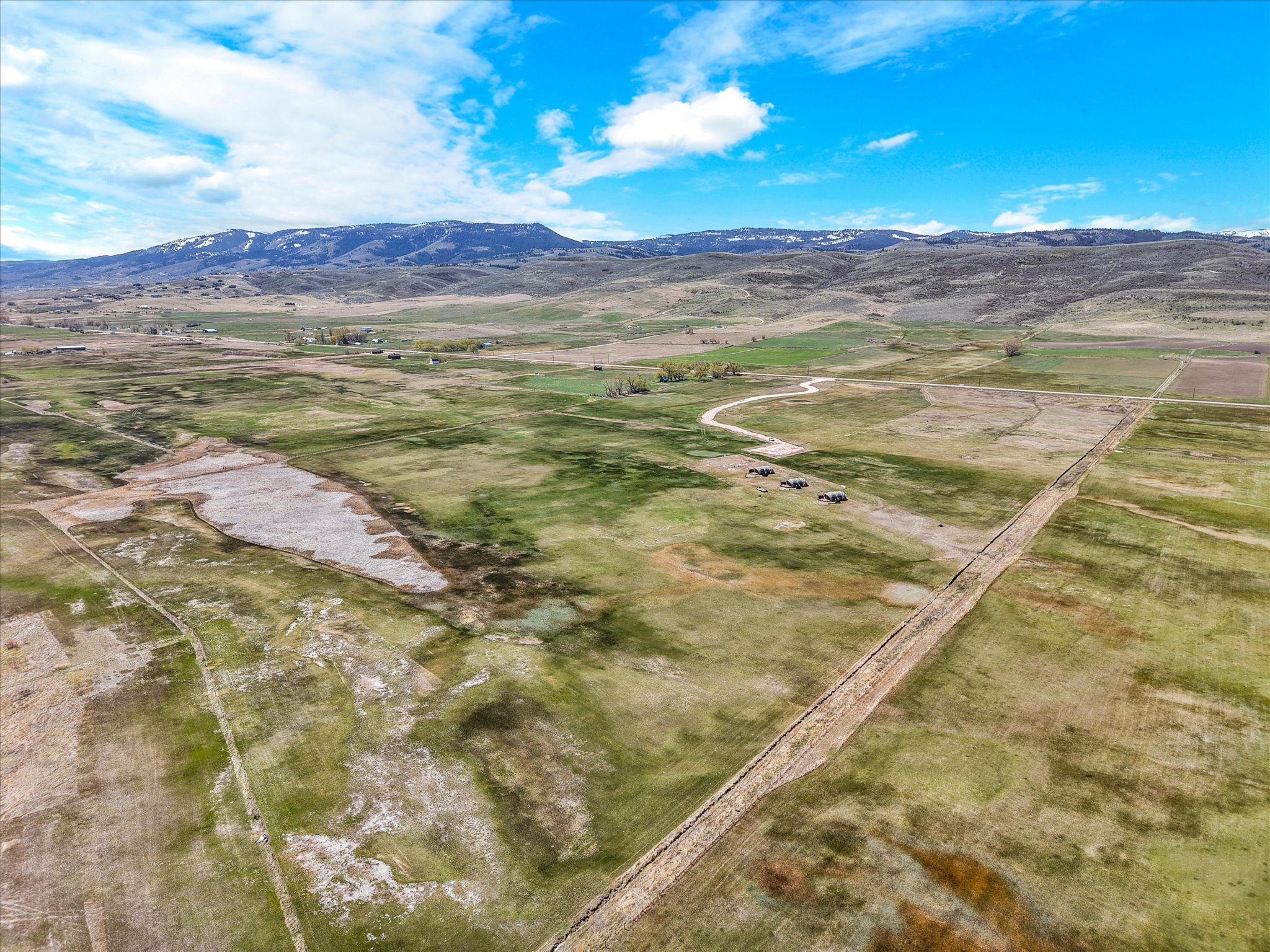Aerial view of sparsely populated area with mountains