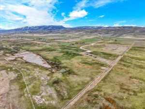 Aerial view of sparsely populated area with mountains
