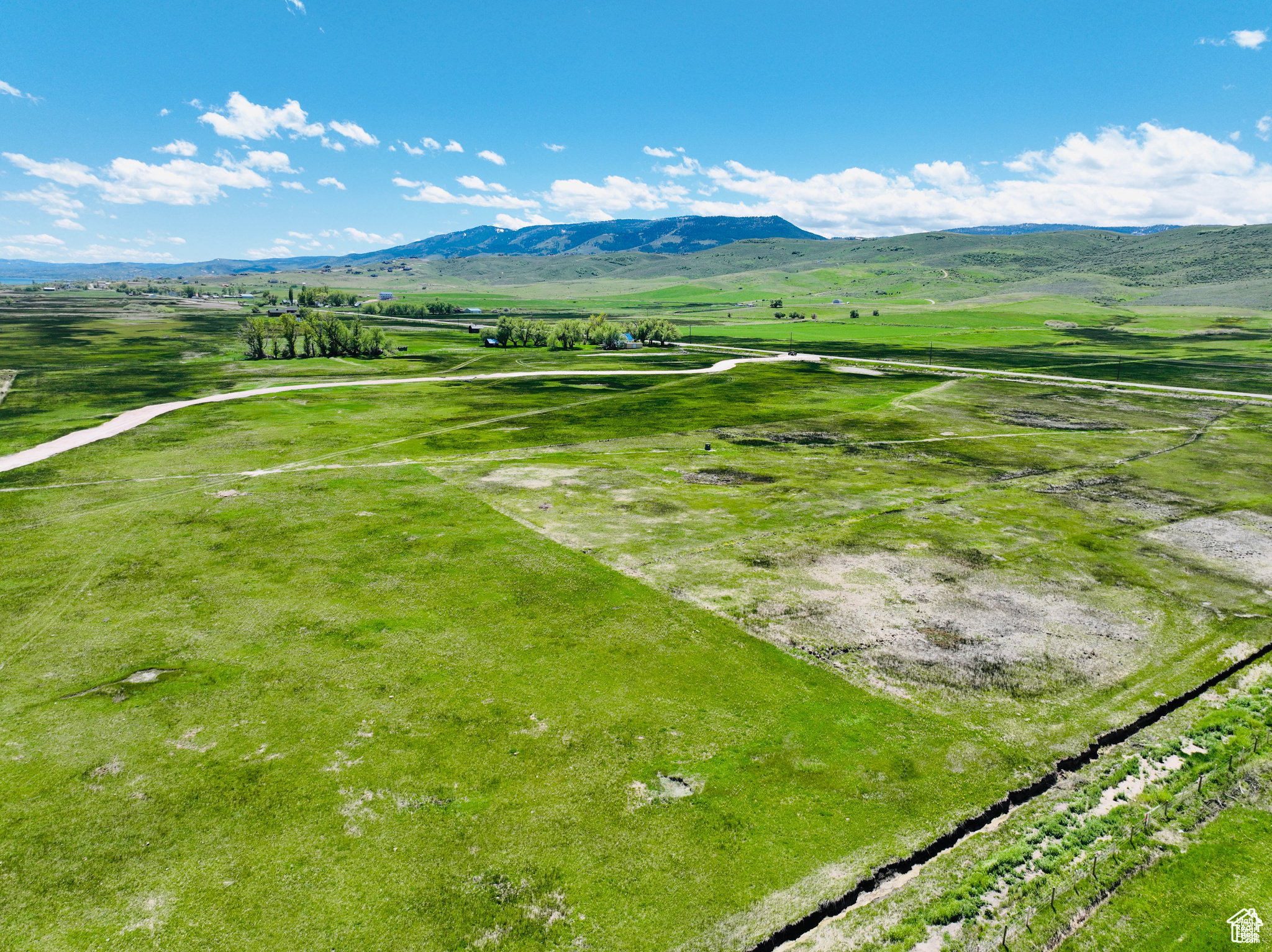 Overview of rural landscape featuring mountains