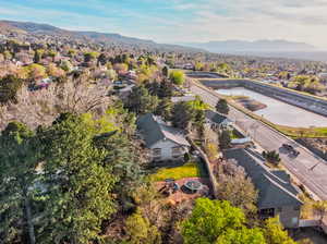 Aerial perspective of suburban area with a mountain backdrop