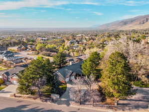 Aerial view of residential area featuring mountains