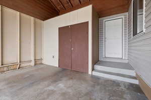 Property entrance featuring a patio area