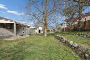 Fenced yard featuring a patio area
