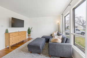 Sitting room featuring wood finished floors and baseboards