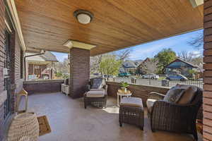 View of patio with a residential view and an outdoor lounge area