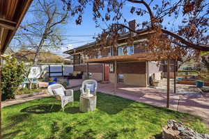 View of yard with an outdoor lounge area, a patio, and a pergola