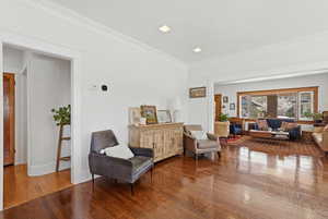 Open concept dining room with hardwood floors