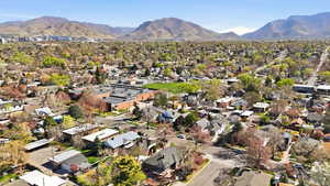 Aerial view of residential area featuring mountains