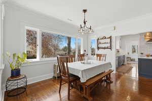 Open concept dining room with hardwood floors