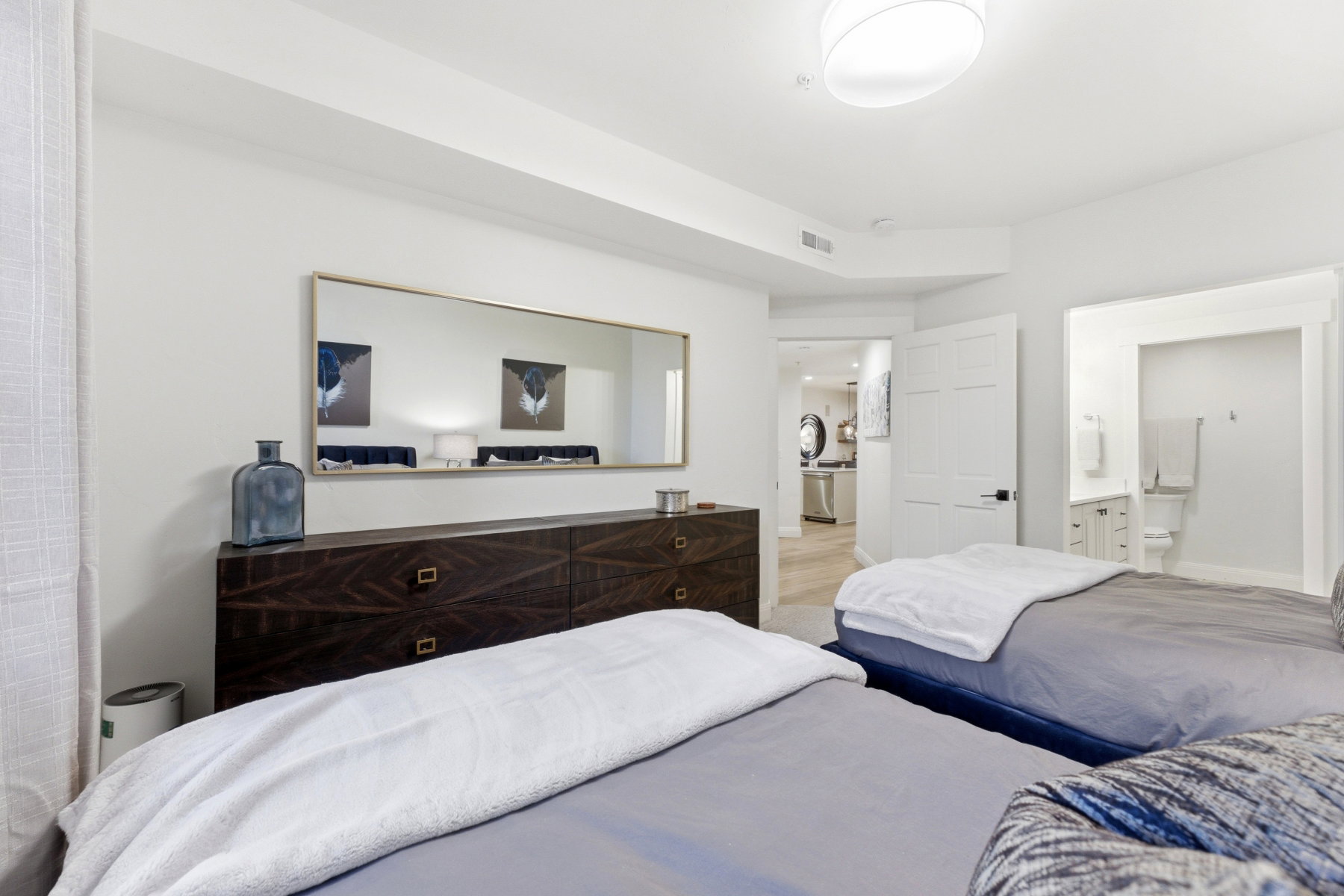 Bedroom featuring ensuite bath