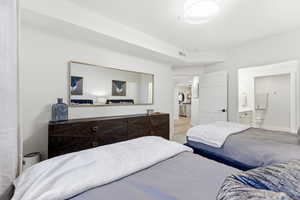 Bedroom featuring ensuite bath