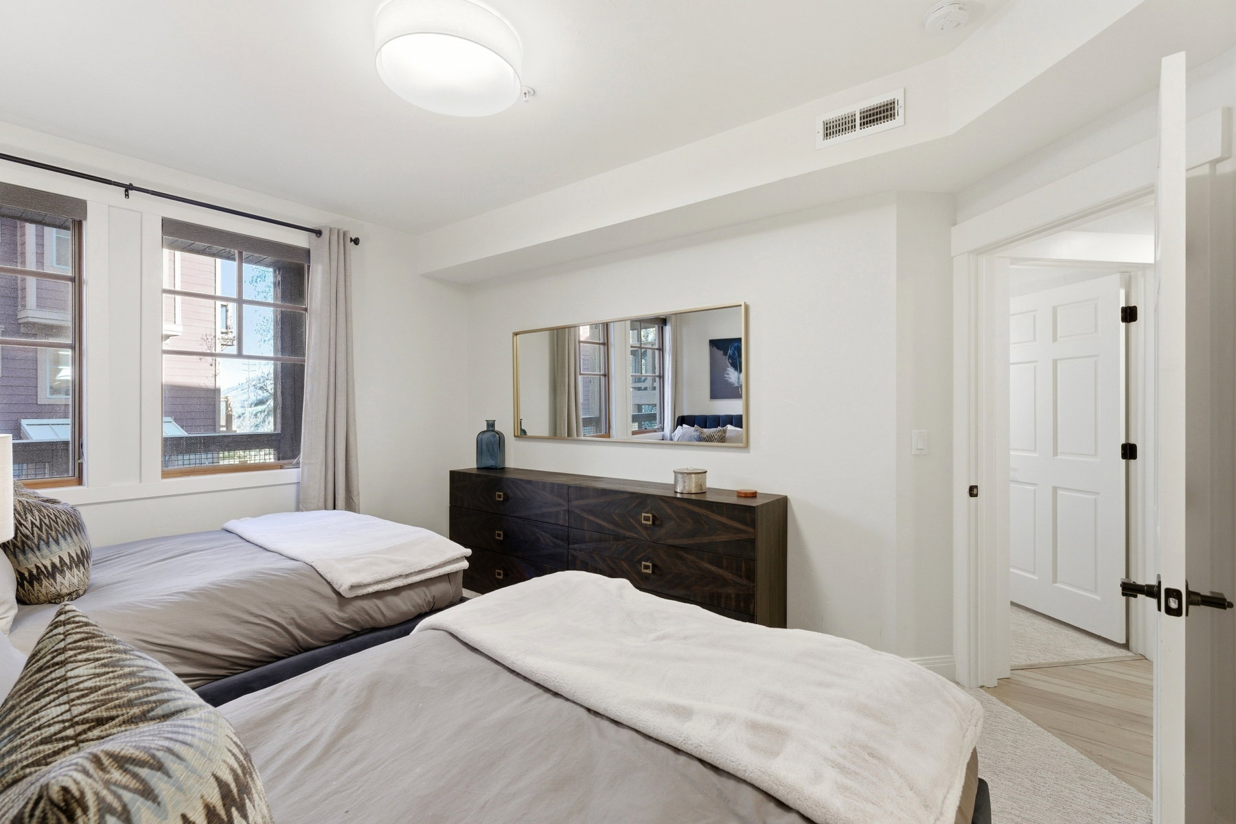 Bedroom with light wood finished floors
