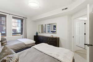 Bedroom with light wood finished floors