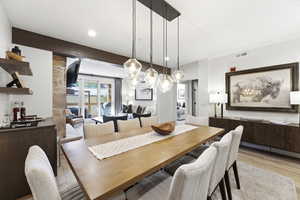 Dining space featuring recessed lighting and light wood-style floors