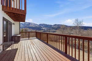Wooden terrace with a mountain view