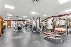 Exercise room featuring a paneled ceiling