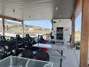 View of patio with outdoor dining space