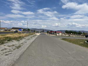 View of asphalt road featuring a mountain view