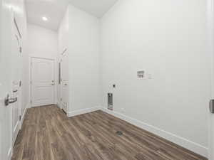 Laundry room with additional storage and access to the garage and community breezeway.