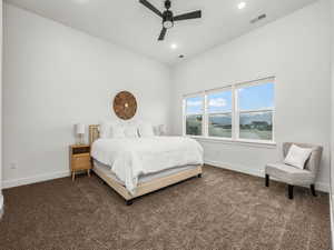 Primary bedroom with walk in closet and en suite bathroom