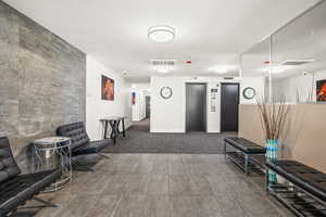 View of building lobby and elevators