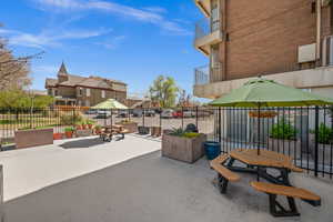 Patio featuring a tables and grill
