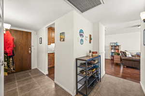 Foyer entrance featuring tile flooring