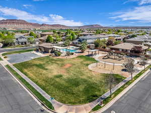 Aerial perspective of suburban area with a mountain backdrop