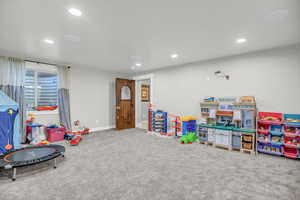 Rec room featuring carpet and recessed lighting