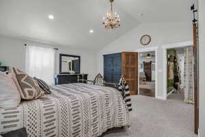Primary Bedroom with carpet flooring, and a high ceiling