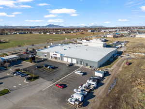 Bird's eye view of a commercial area and a mountain backdrop