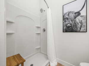 Primary en suite with double vanity and walk in shower