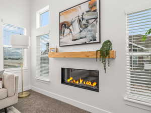 Great room with vaulted ceilings and cozy fireplace.