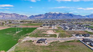 Aerial view of residential area featuring mountains
