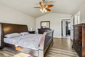 Bedroom featuring light wood finished floors and ceiling fan