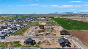 Aerial perspective of suburban area with mountains
