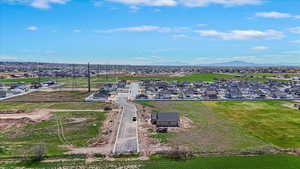 Aerial view of residential area featuring a mountain backdrop