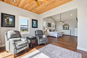 Bedroom featuring recessed lighting, a ceiling fan, dark wood finished floors, and lofted ceiling