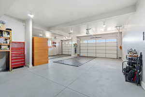 Garage featuring baseboards