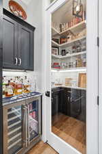 Storage area featuring beverage cooler