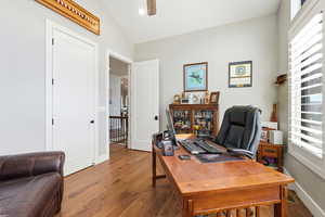 Office area with wood finished floors, ceiling fan, lofted ceiling, and recessed lighting