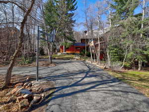 Long, flat driveway with parking for 7 to 8  vehicles!