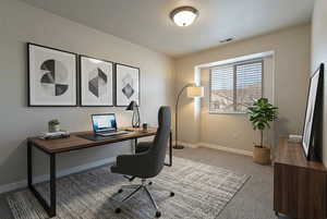 Office area featuring light carpet and baseboards