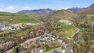 Aerial view of residential area with a mountainous background