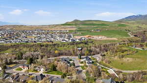 Aerial perspective of suburban area with a mountain backdrop